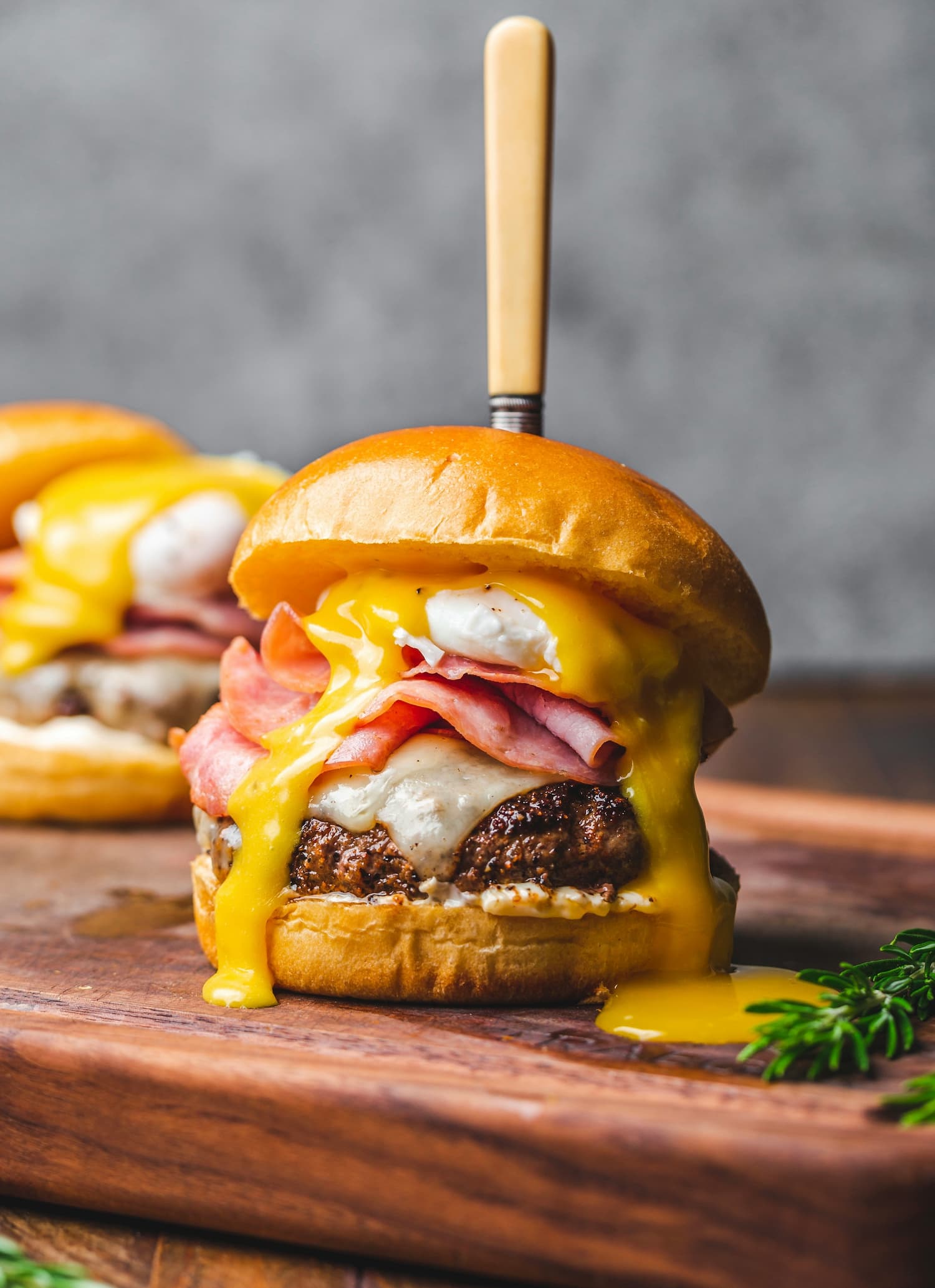 Burger topped with MooShine beer cheese